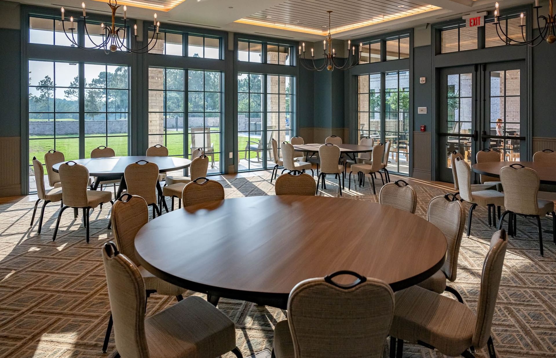 Banquet set-up in a meeting room with a garden view at Camp Creek Inn