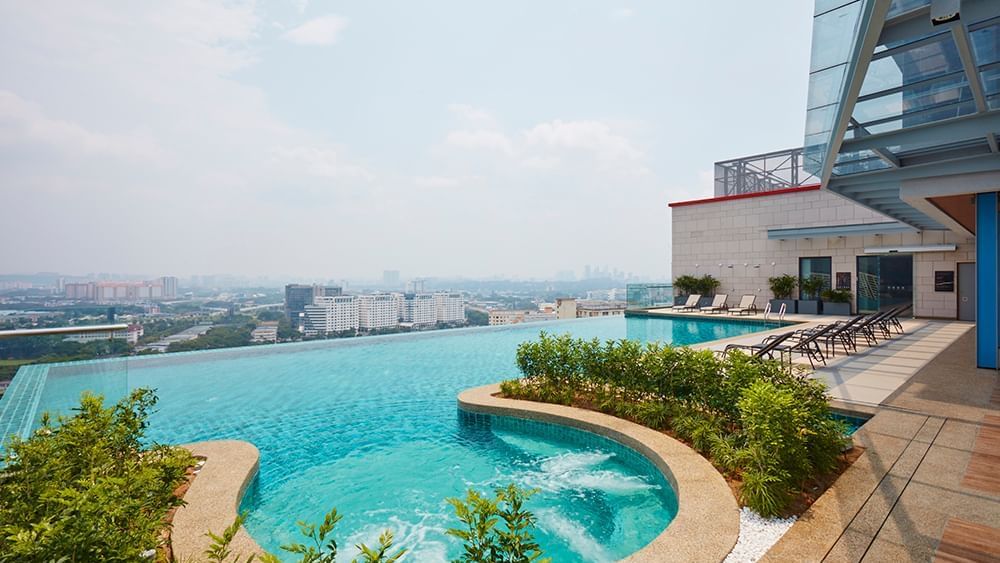Jacuzzi at Sunway Velocity Hotel rooftop Infinity pool looking out to Kuala Lumpur skyline view