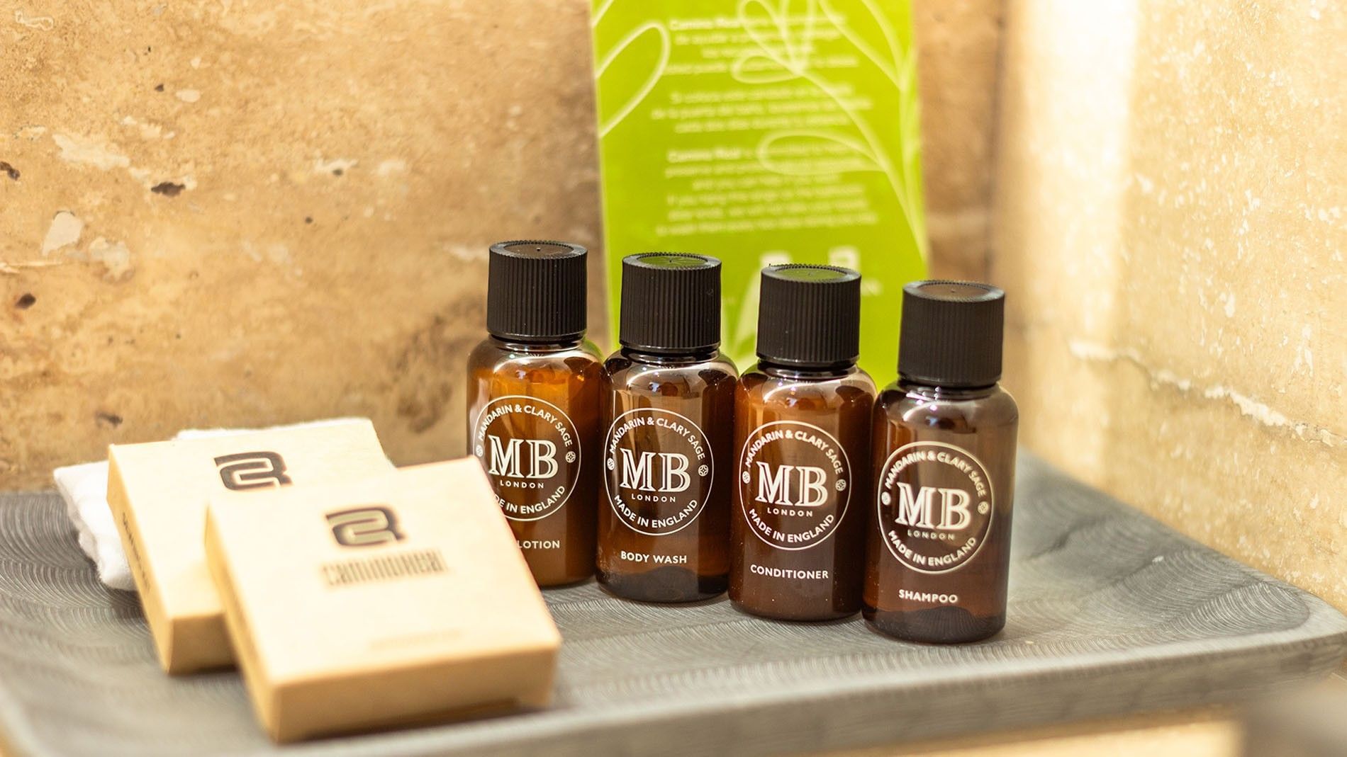 Hotel toiletries with body wash & shampoo, on a tray in Ocean View King Deluxe Superior Room at Camino Real Acapulco Diamante