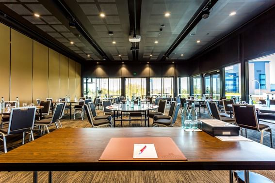 Banquet tables arranged for a Meeting at Hotel Grand Chancellor