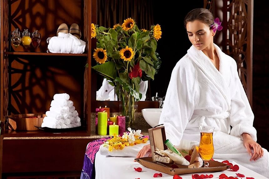 A girl with a bathrobe in a spa area at 2 Seasons Hotel & Apt