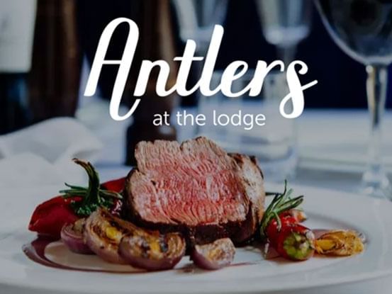 Steaks with meat and vegetables in Antler’s at The Lodge at Fairmont Hot Springs Resort