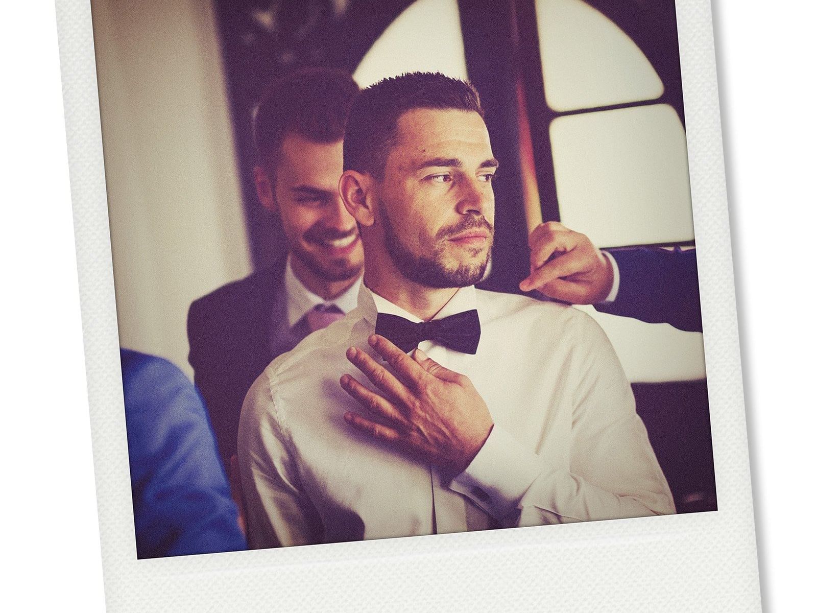 Photo Booth Image of groom getting ready at Dream Midtown NYC