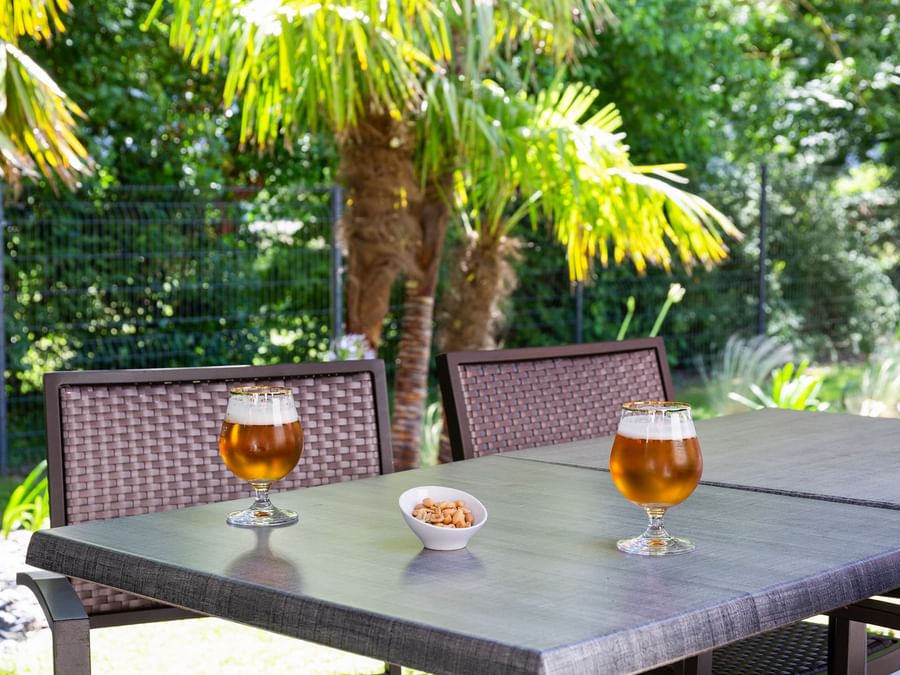 Two beer glasses on a table at Hotel Saint James