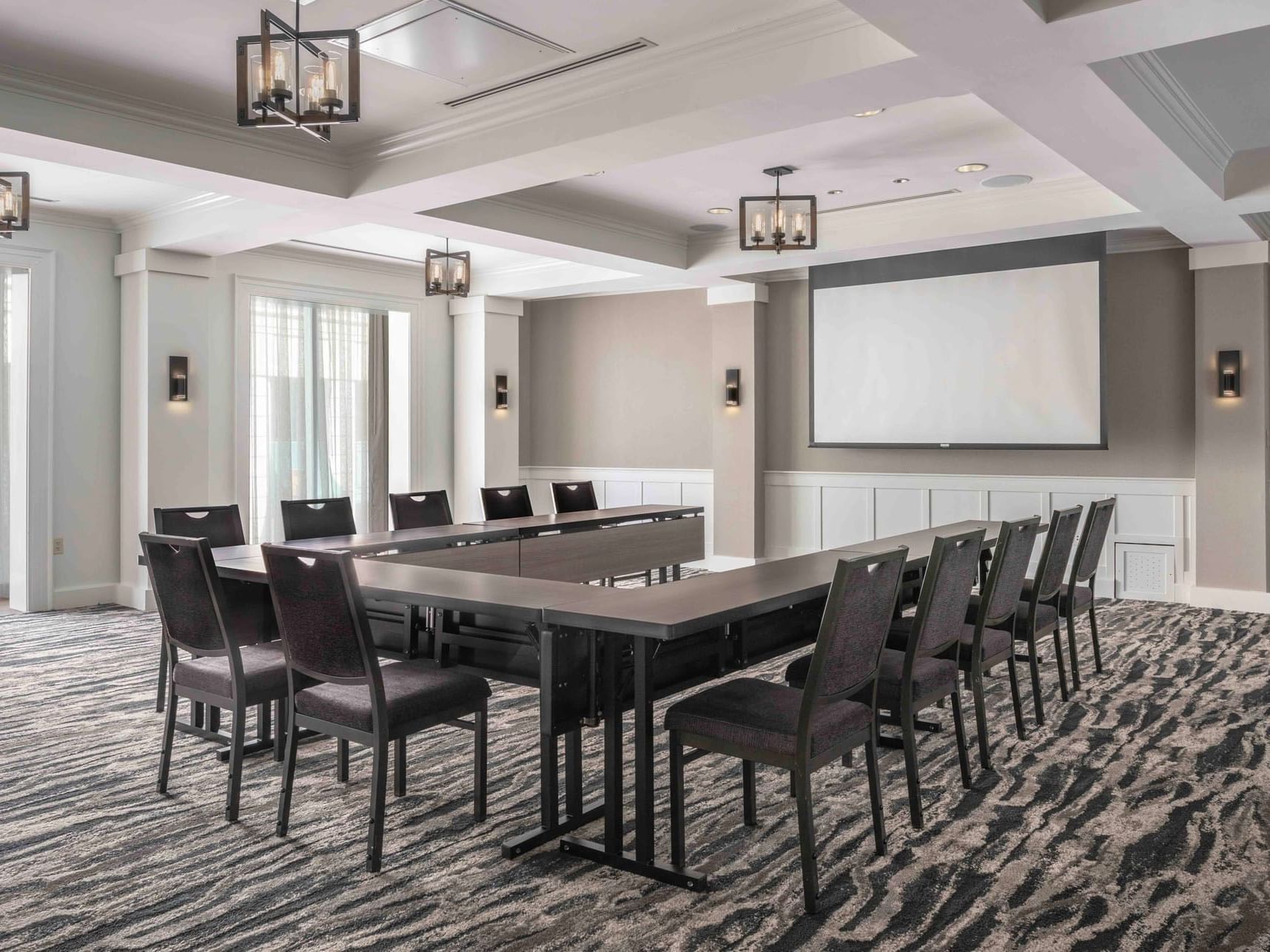 U-shaped table set-up in McKinley Room with carpeted floors at Portland Harbor Hotel