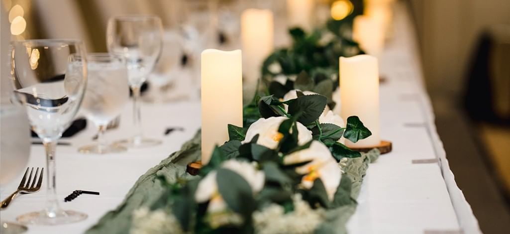 An elegantly decorated table set for a small group at an elopement reception venue in Canmore.