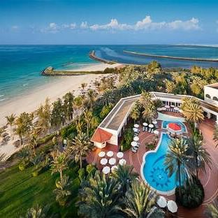 Aerial view of the Ajman Hotel with beach coast
