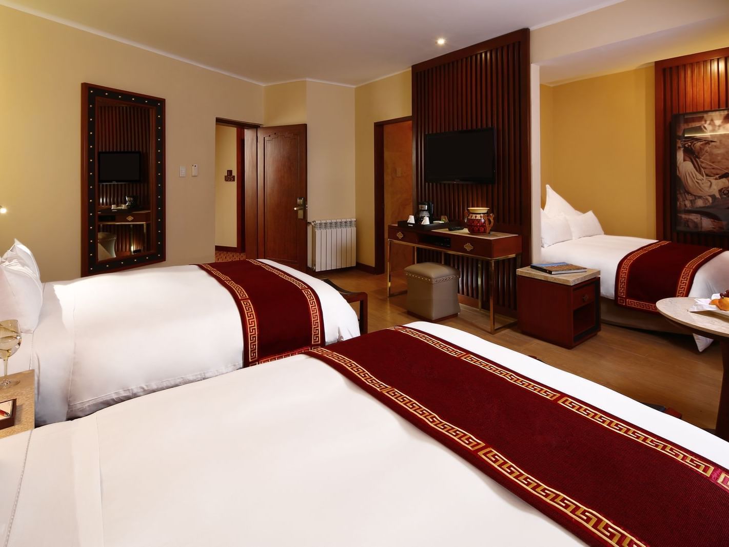 Sumaq Deluxe family room with three beds at Hotel Sumaq