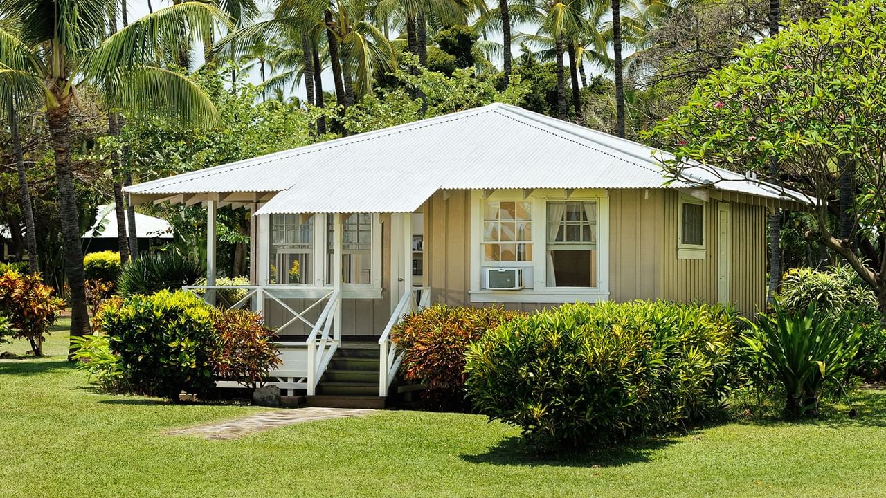 Waimea Plantation Cottages Cottage 66 Exterior with trees and bushes