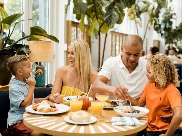 A family enjoying breakfast at The Diplomat Resort