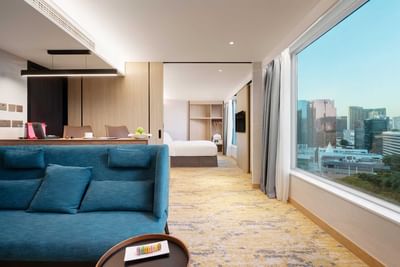 Arranged sofa with a living area in Deluxe Suite at Park Hotel Hong Kong