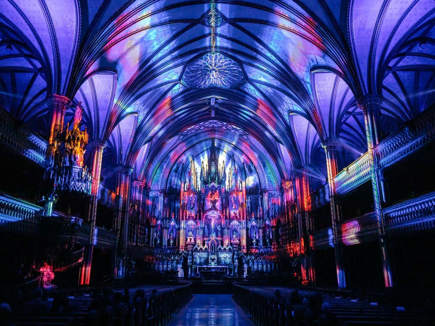 Aura Light Show in Notre-Dame Basilica near Honeyrose Hotel