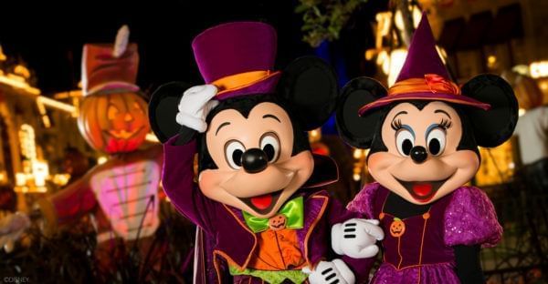 Mickey and Minnie Mouse in Halloween costumes at Magic Kingdom near Lake Buena Vista Resort Village & Spa