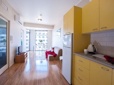Living & dining area within a 2 bedroom small apartment_UniLodge 570 Swanston