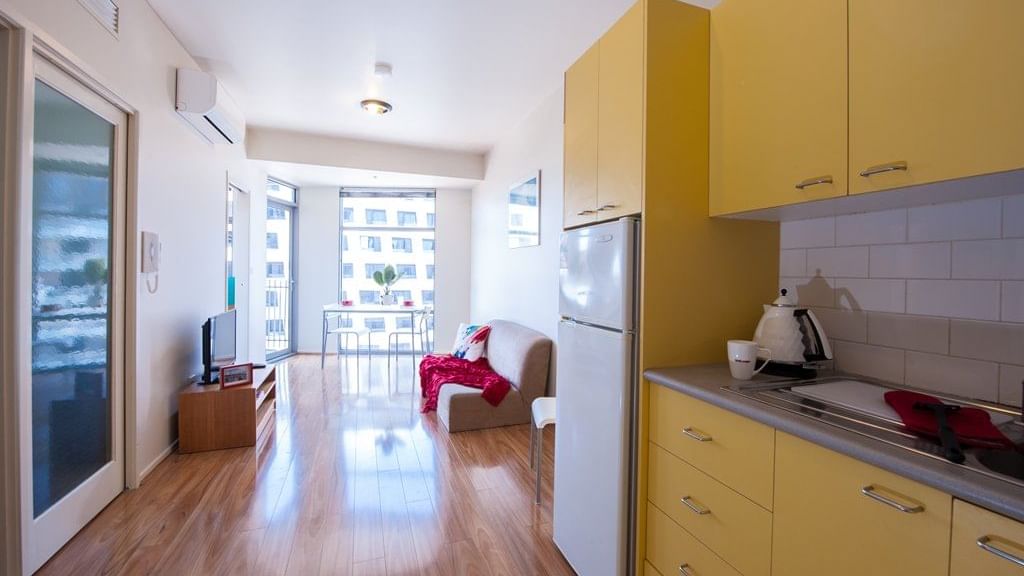 Living & dining area within a 2 bedroom small apartment_UniLodge 570 Swanston