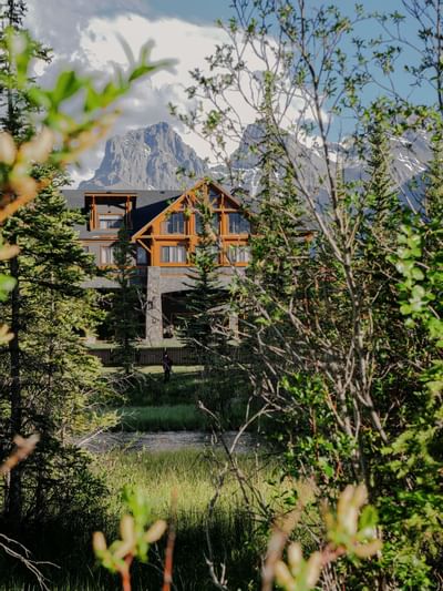 Exterior view of The Malcolm Hotel with a mountain view