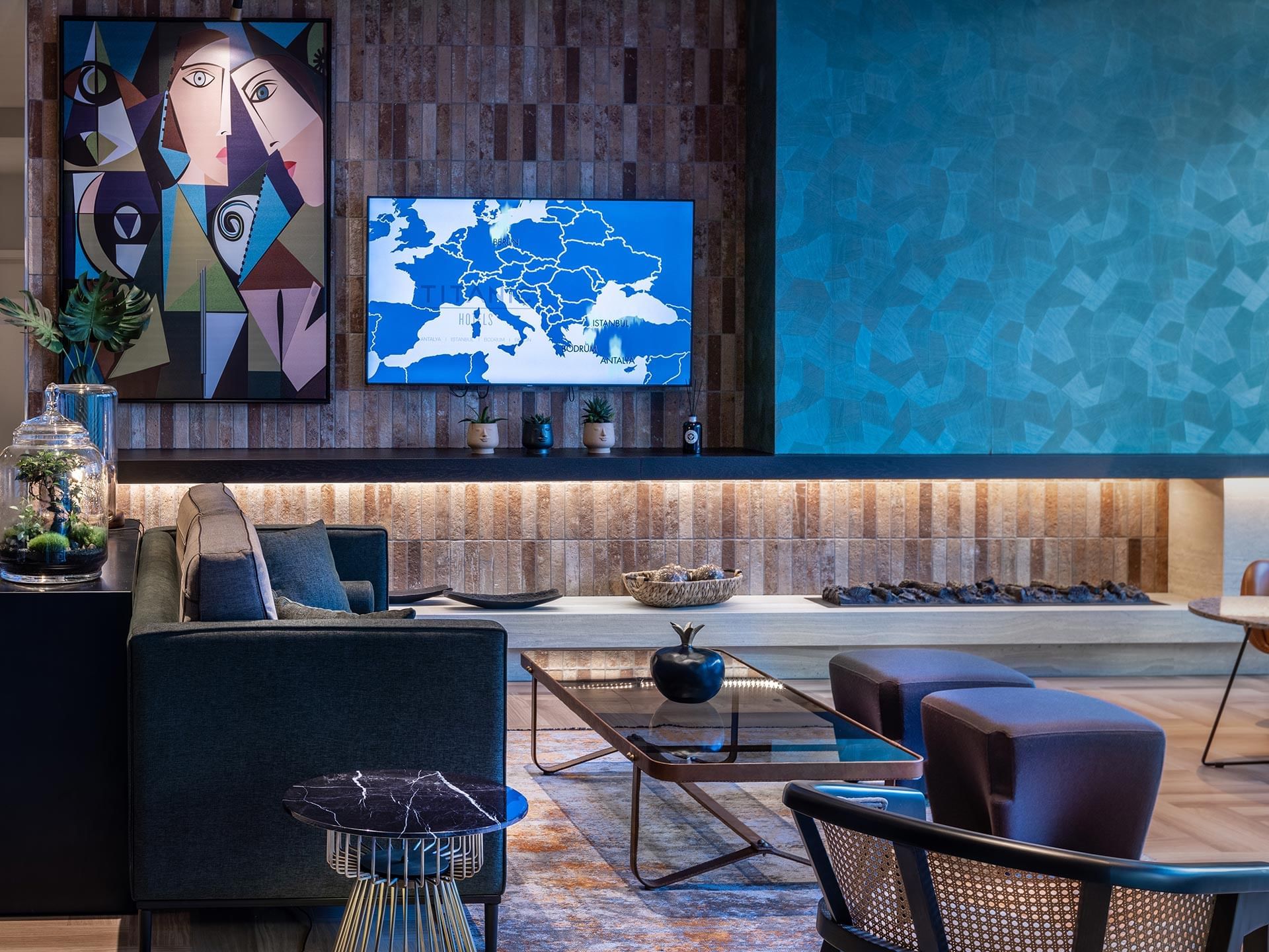 Lobby area with sofa and artwork at Titanic Comfort Kurfürstendamm