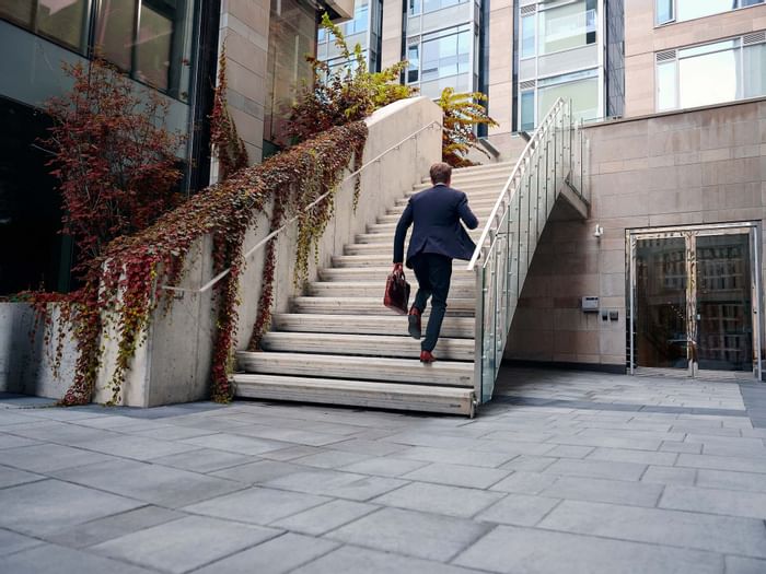 A man walking up the stairs at ReStays Ottawa