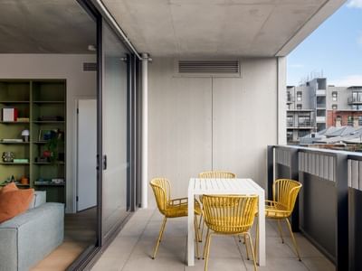 Modern balcony at Swift Walk display apartment with Melbourne suburb in view.