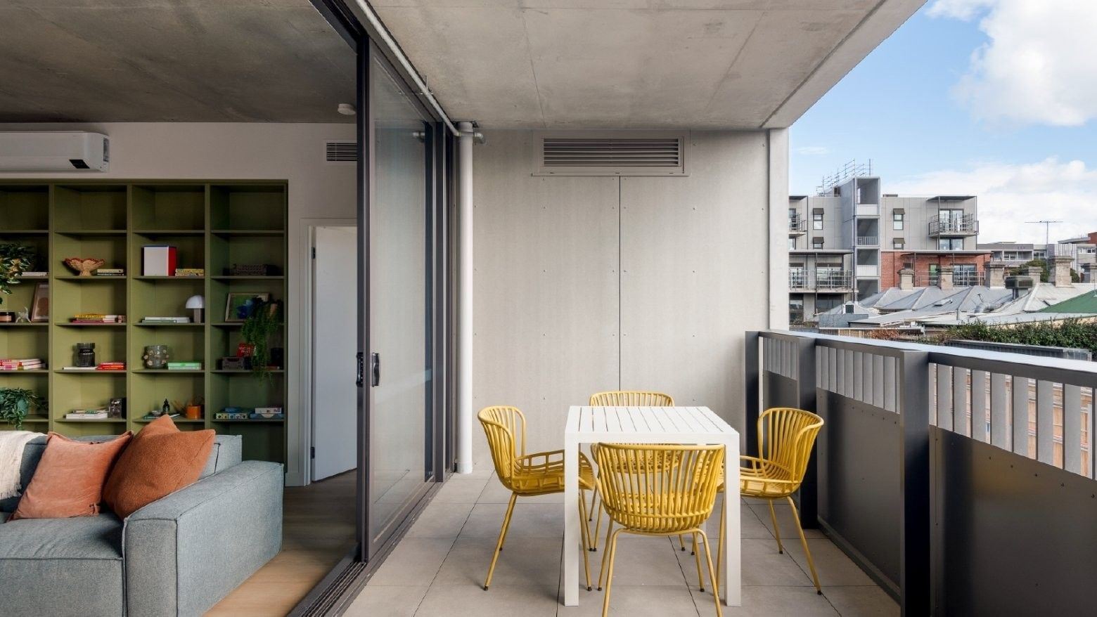 Modern balcony at Swift Walk display apartment with Melbourne suburb in view.