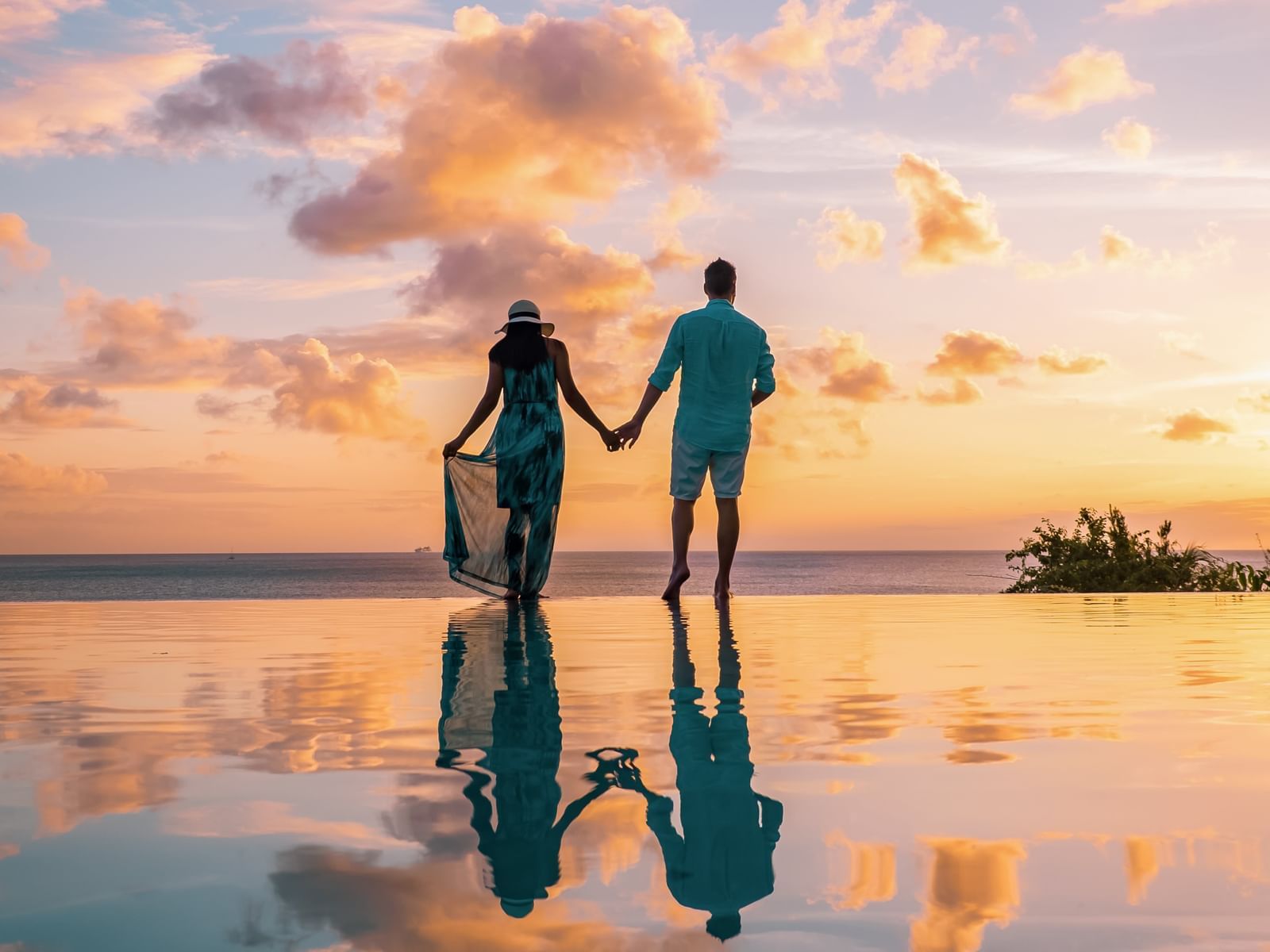 Couple enjoying at sunset near Tanjung Rhu Resort Langkawi