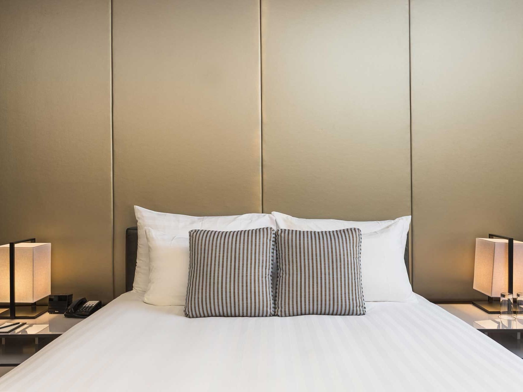 Comfy bed in Penthouse Emporium suite by Chatrium