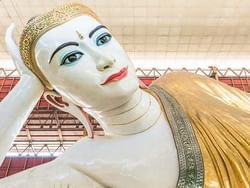 Huge statue of Buddha in Shwedagon Pagoda near Chatrium Hotel Royal Lake Yangon