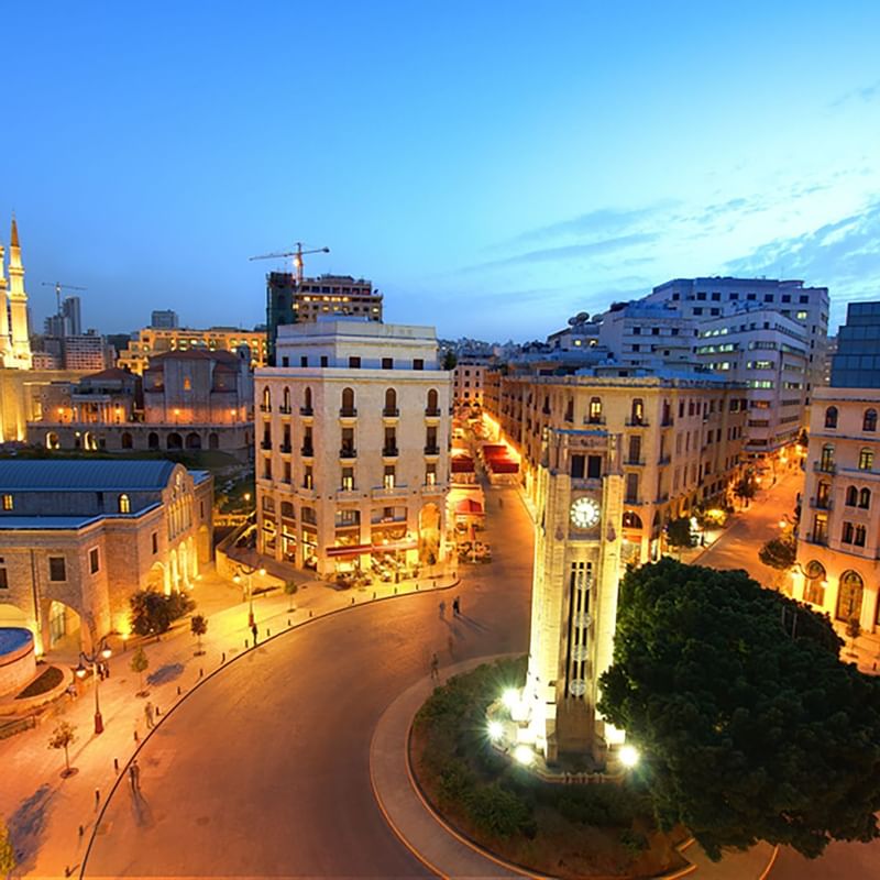 A vibrant view of Beirut, showcasing the Mohammad Al-Amin Mosque and a clock tower near Warwick Hotels and Resorts