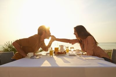 A couple dining in a table at Sunseeker Resort