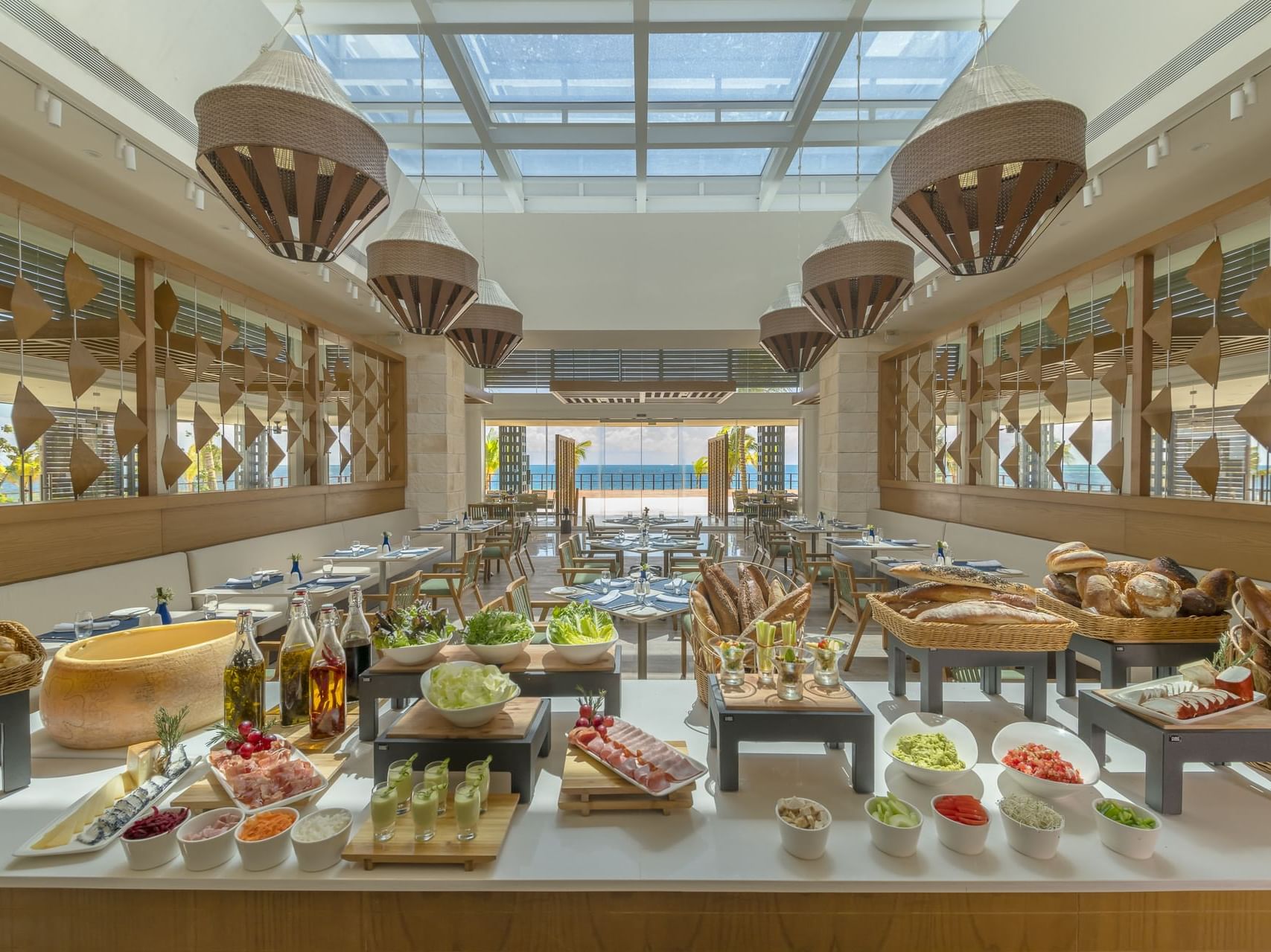 Variety of bread, fruits & smoothies at the buffet spread of Vora Mar Restaurant at Haven Riviera Cancun
