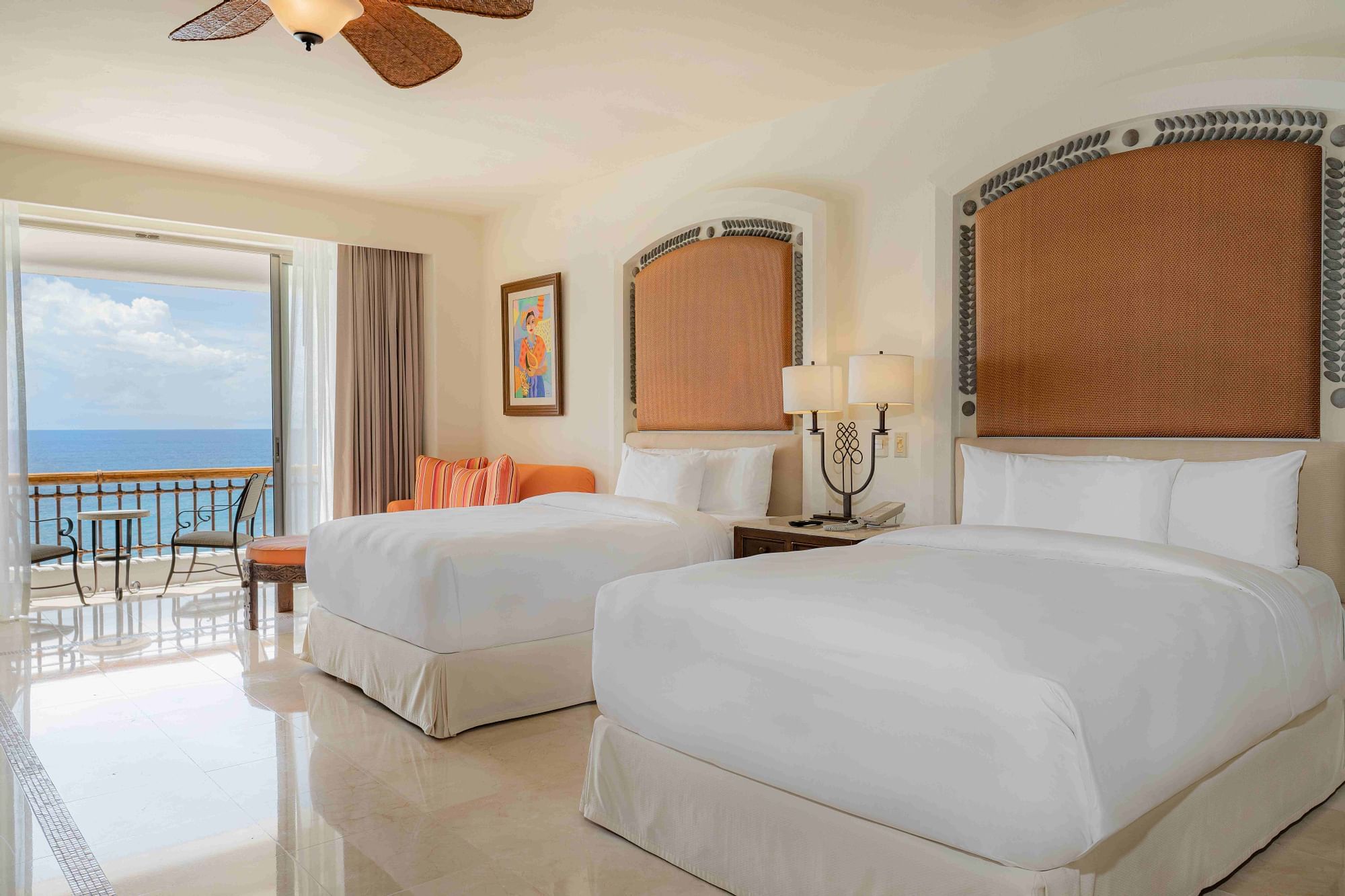 habitacion con dos camas queen en hoteles playa los cabos