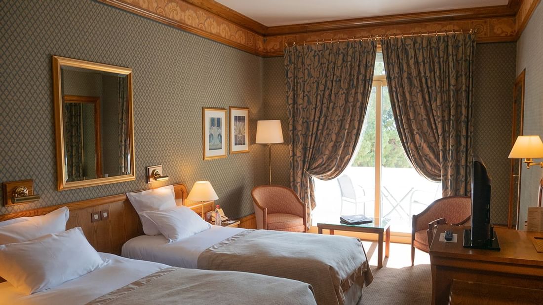Superior Room at the Domaine De Divonne with single beds.