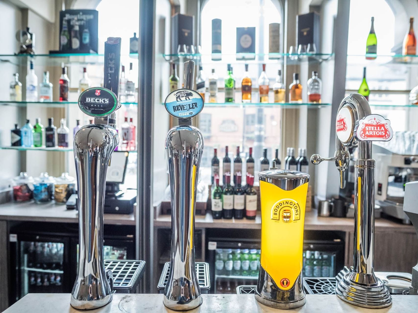 Beer pumps in the hotel bar at Townhouse Hotel Manchester