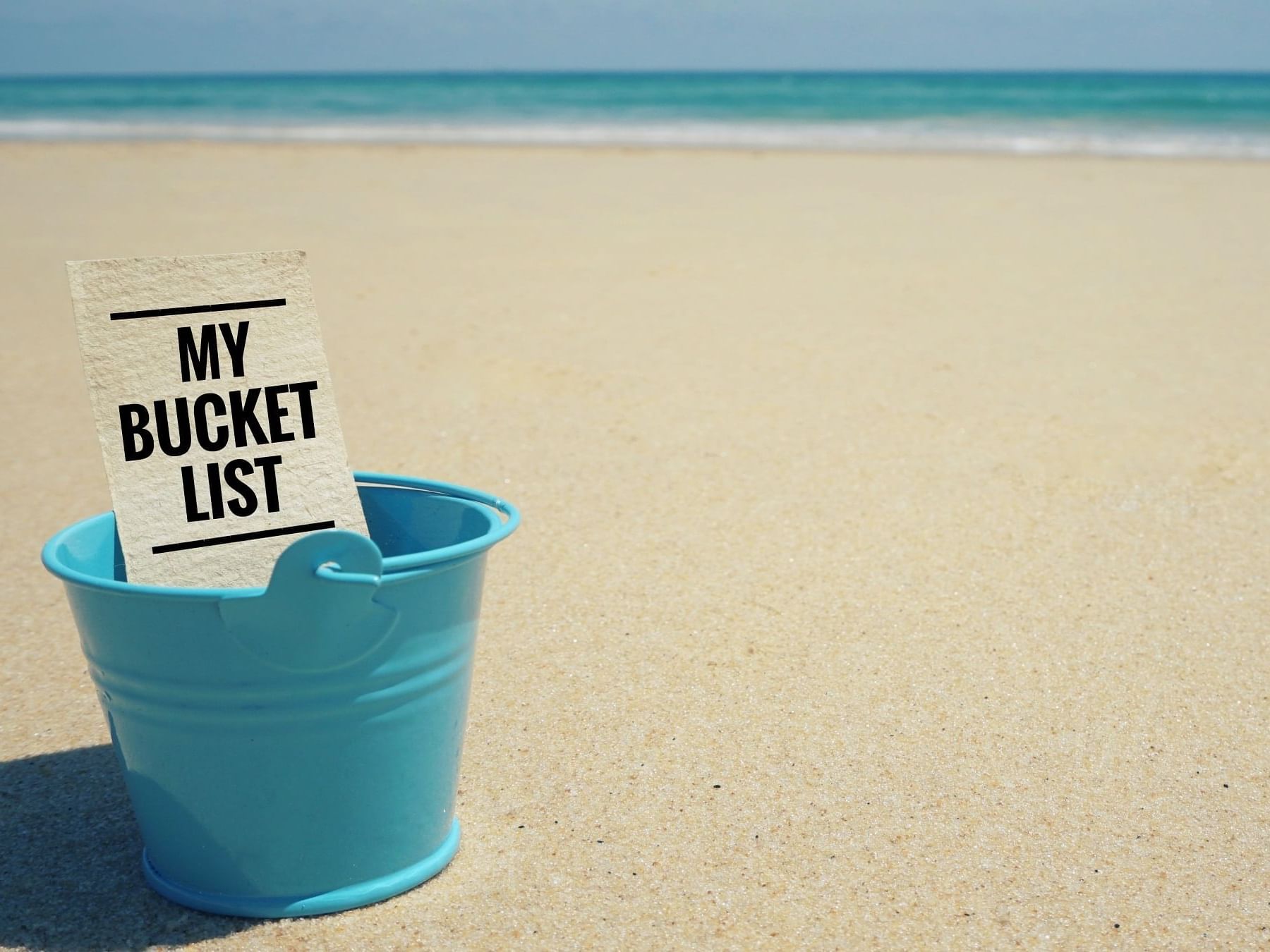 Close up of a Blue bucket on beach at Daydream Island Resort