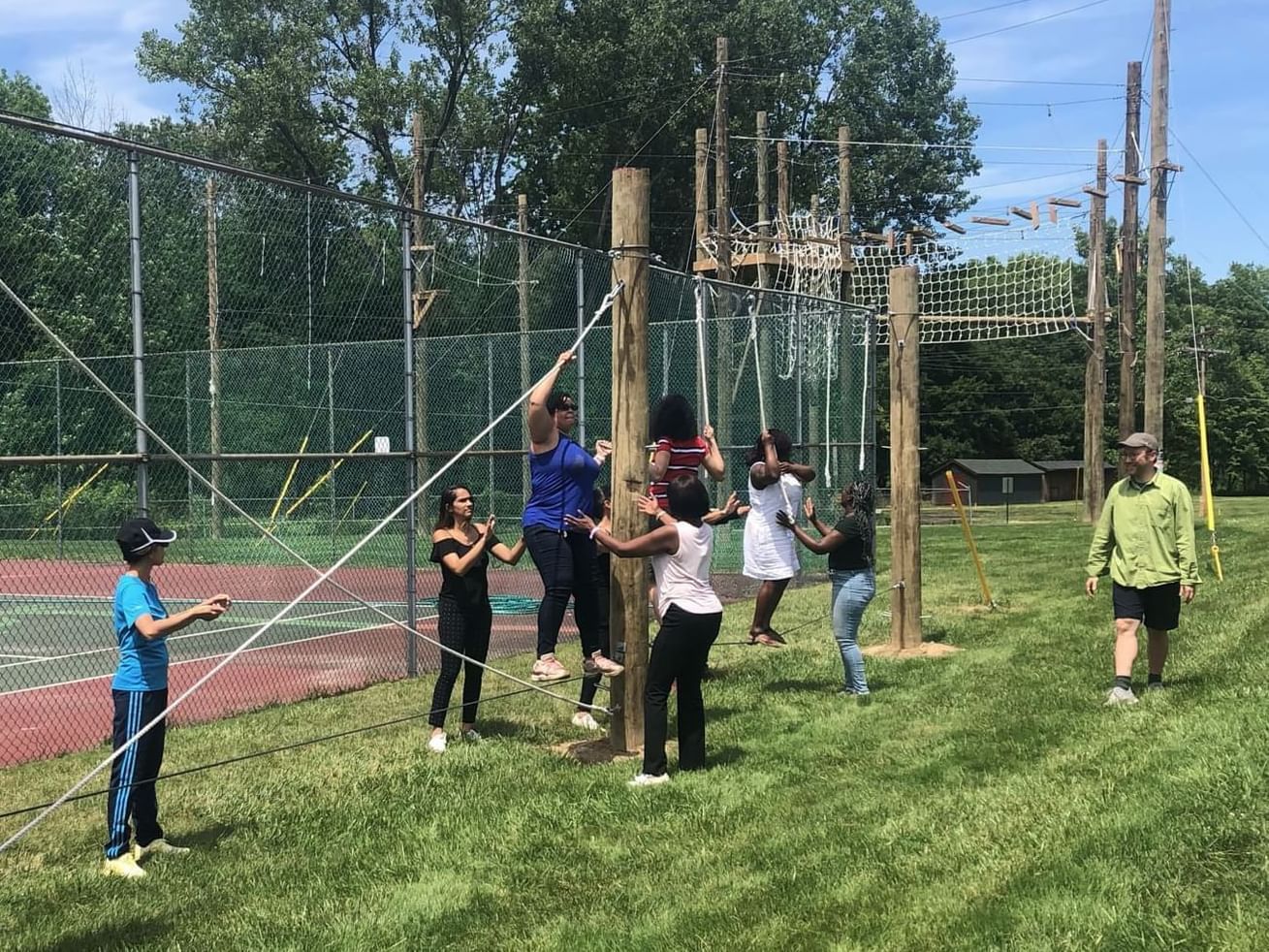 Few People trying low-rope activities at Honor’s Haven Retreat