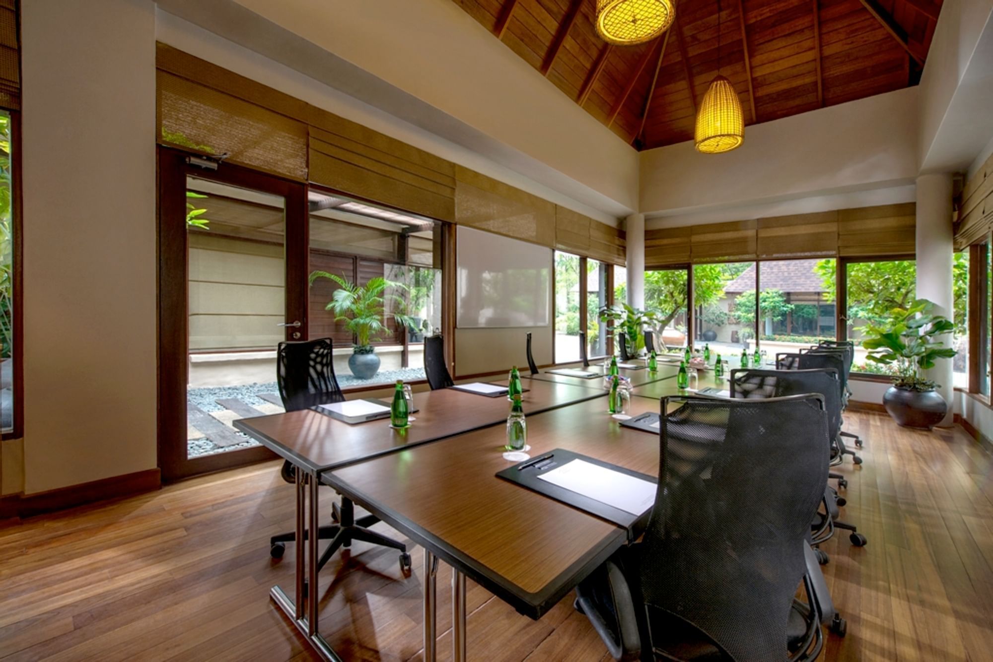 Conference table arranged in a Meeting Room at The Banjaran Hotsprings Retreat