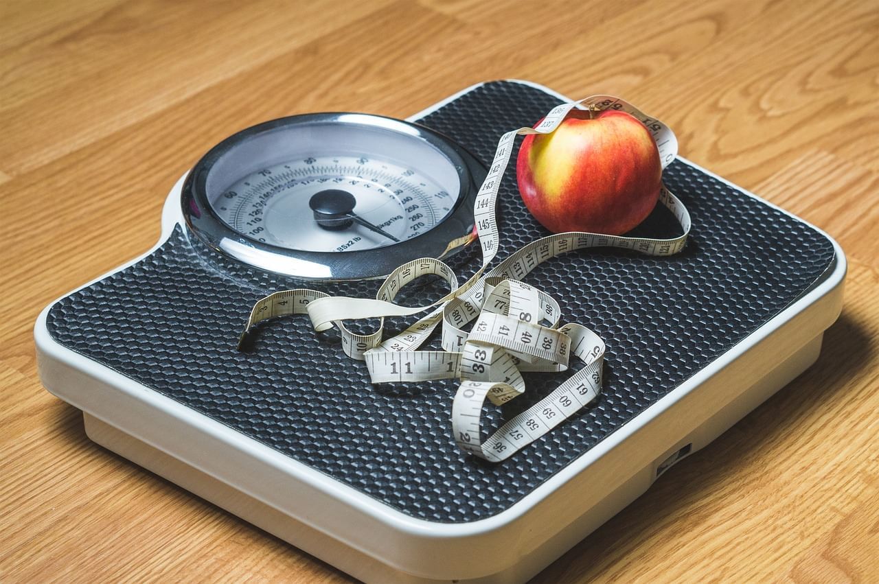 Scale with a measuring tape and an apple on top at Lake Buena Vista Resort Village & Spa