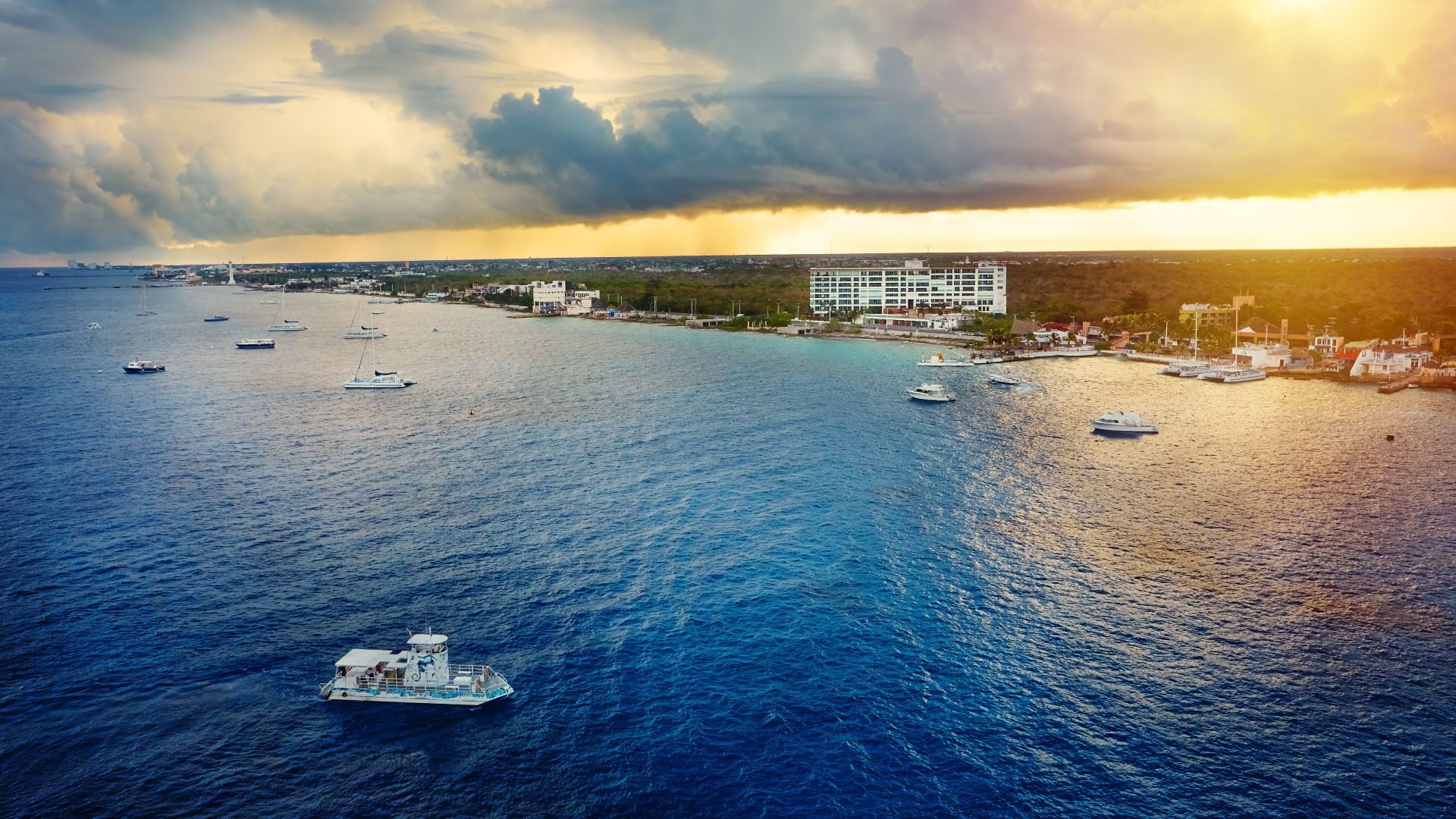 Distant view of The Explorean Cozumel by the ocean