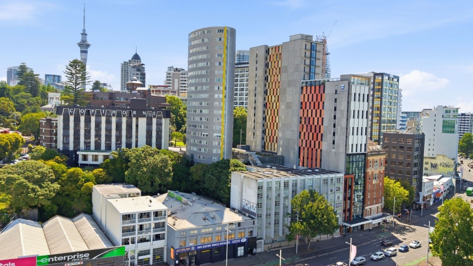 A cityscape with several buildings and trees at Student Living Auckland – Anzac.