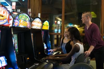 3 People playing games in the casino at Holiday Inn Montego Bay