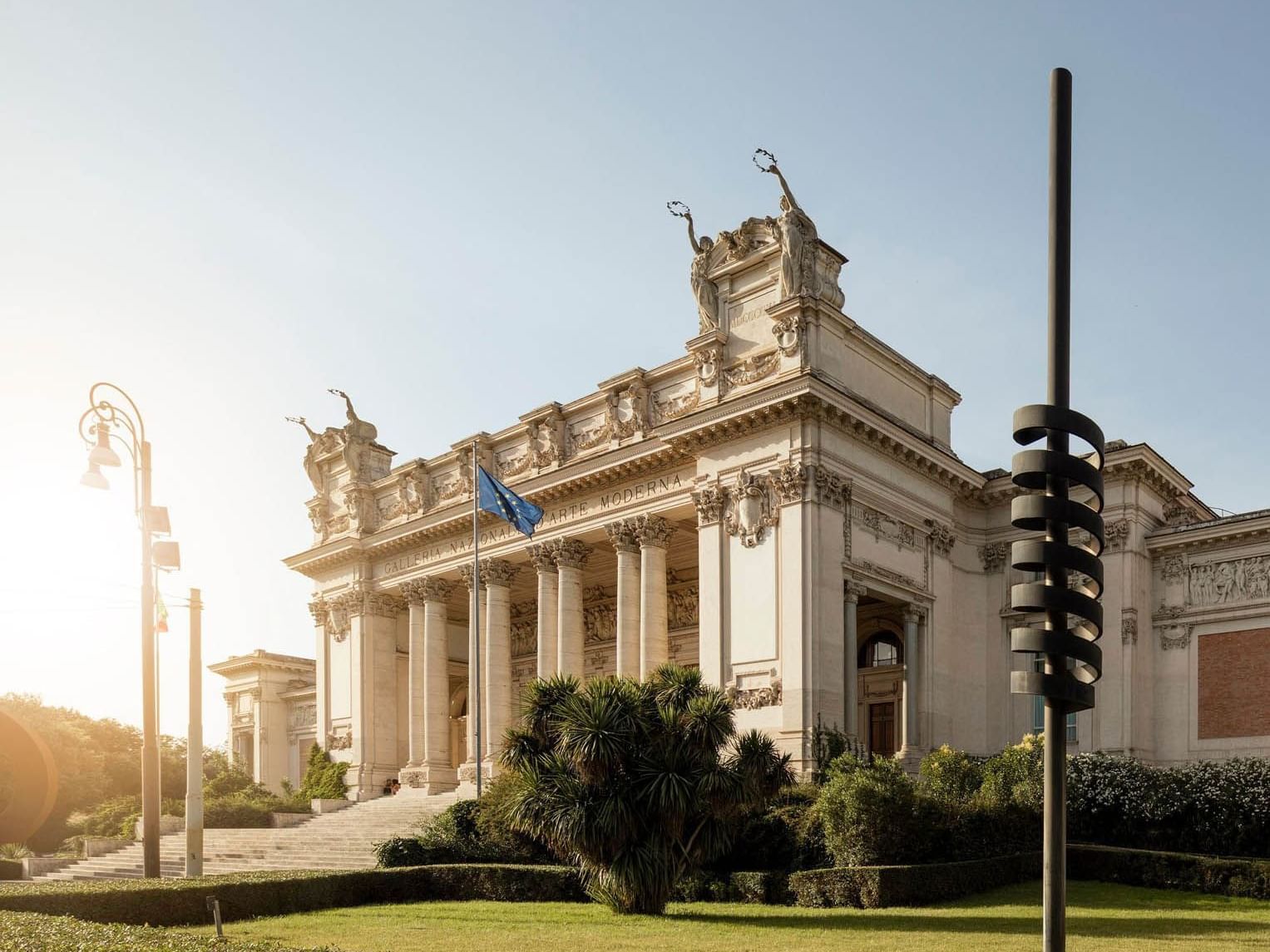 Exterior of Galleria Nazionale d'Arte Moderna with classical architecture, and gardens near The Guardian Hotel