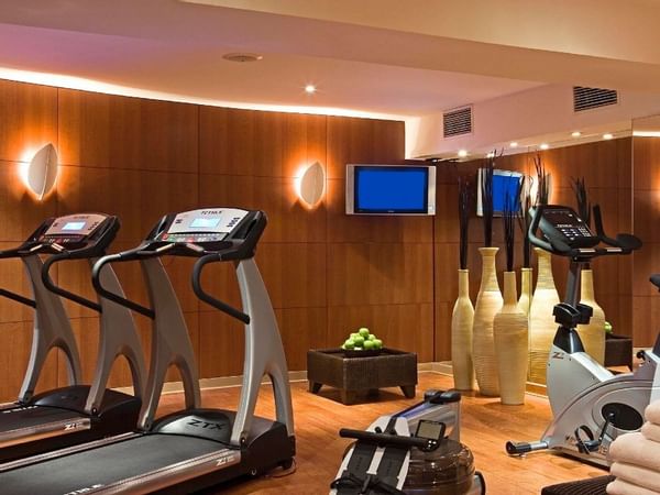 Fully equipped fitness room at Warwick Brussels