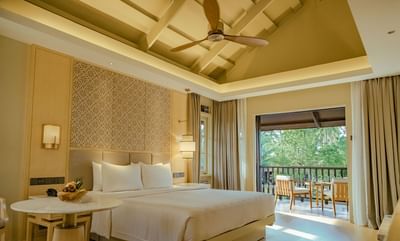 King bed & balcony in Lake Front at Pelangi Beach Resort & Spa