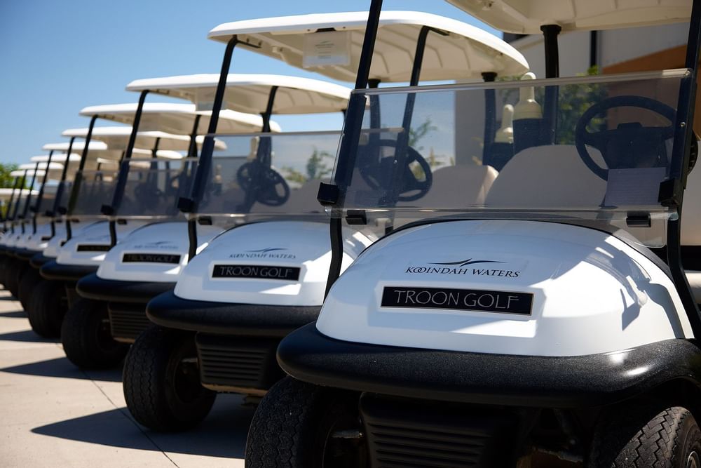 Kooindah Golf with golf carts lined up ready for golfers