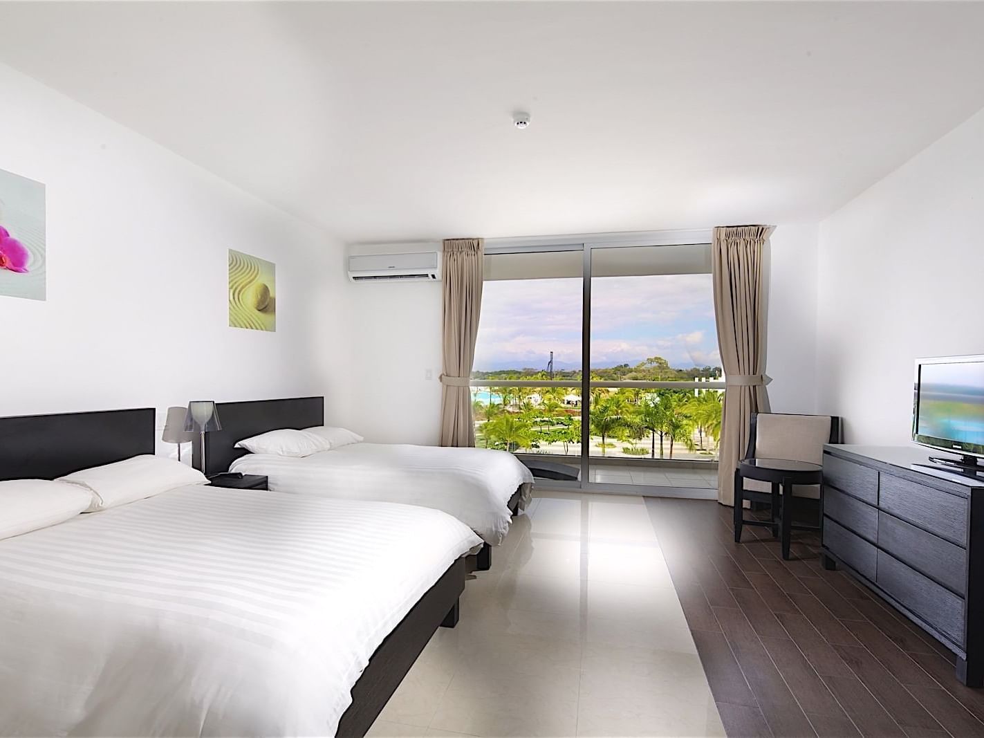 Master Suite room with 2 full beds at Playa Blanca Beach Resort