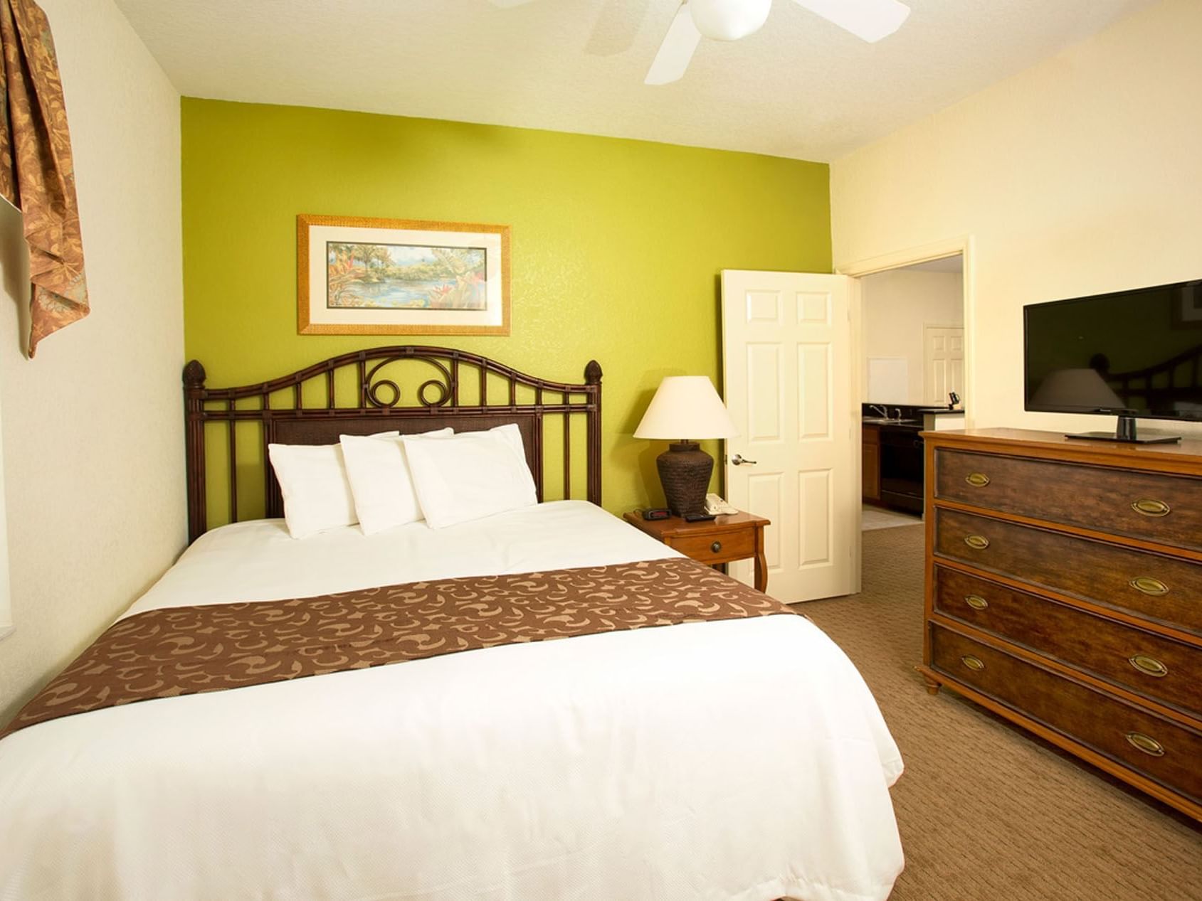 Queen Bed & TV in 3-Bedroom 2-Bath Ada Suite with Roll in Shower at Lake Buena Vista Resort Village & Spa