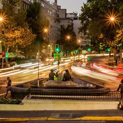 Night view of busy street near Hotel Ismael