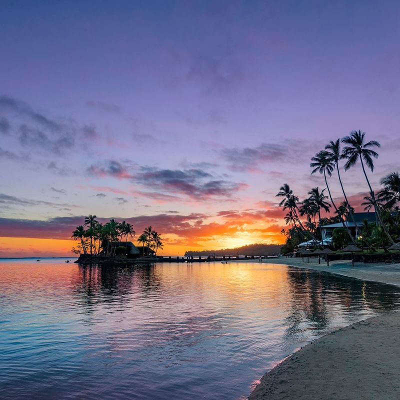 Landscape view of the beach & sunset at The Naviti Resort - Fiji
