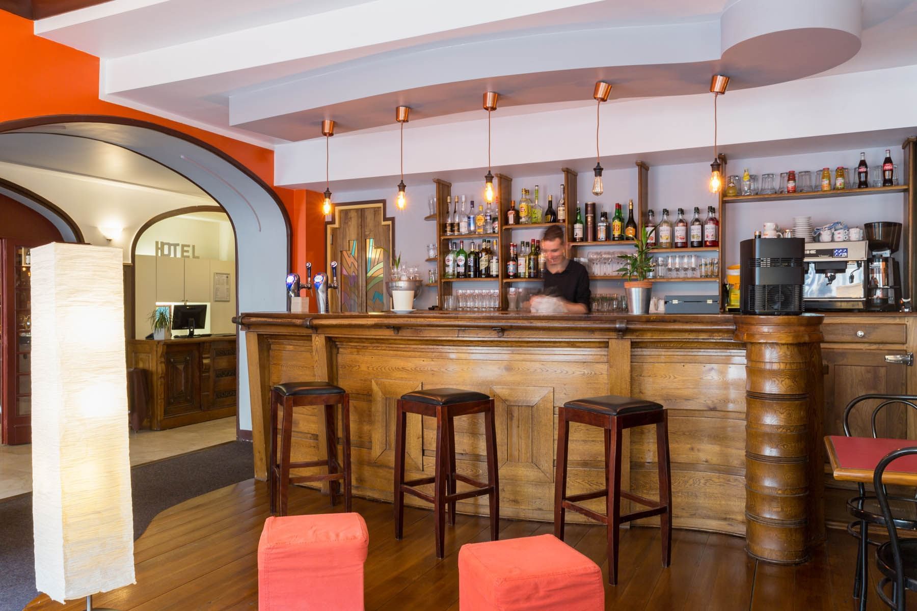 The bar at Hotel Bristol with bottles arranged on shelves