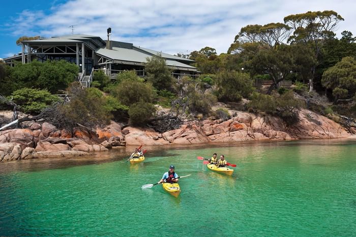 People Kayaking at the Great Oyster Bay near Freycinet Lodge